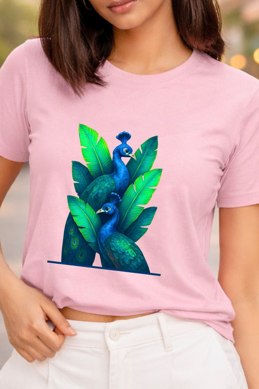 close up view of an Indian woman wearing peacock print graphic t-shirt in pink — neon blue green design by ZUPPI