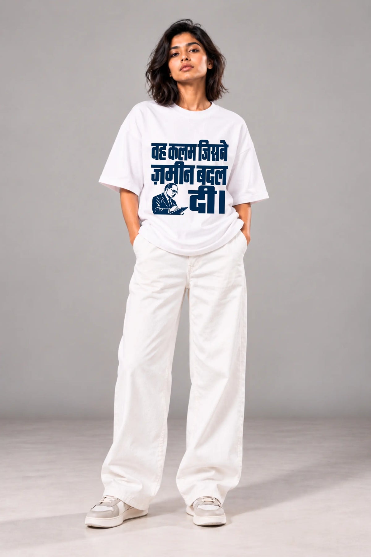 Woman wearing unisex oversized terry tee with Ambedkar portrait and Woh Kalam Jisne Zameen Badal Di print | JUNOSHI
