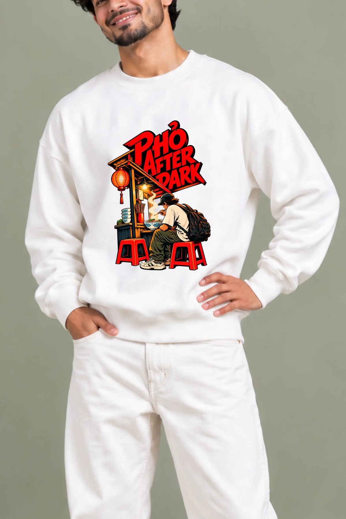 Pho After Dark oversized sweatshirt close-up featuring a traveller eating pho under a red paper lantern — Cam On Vietnam