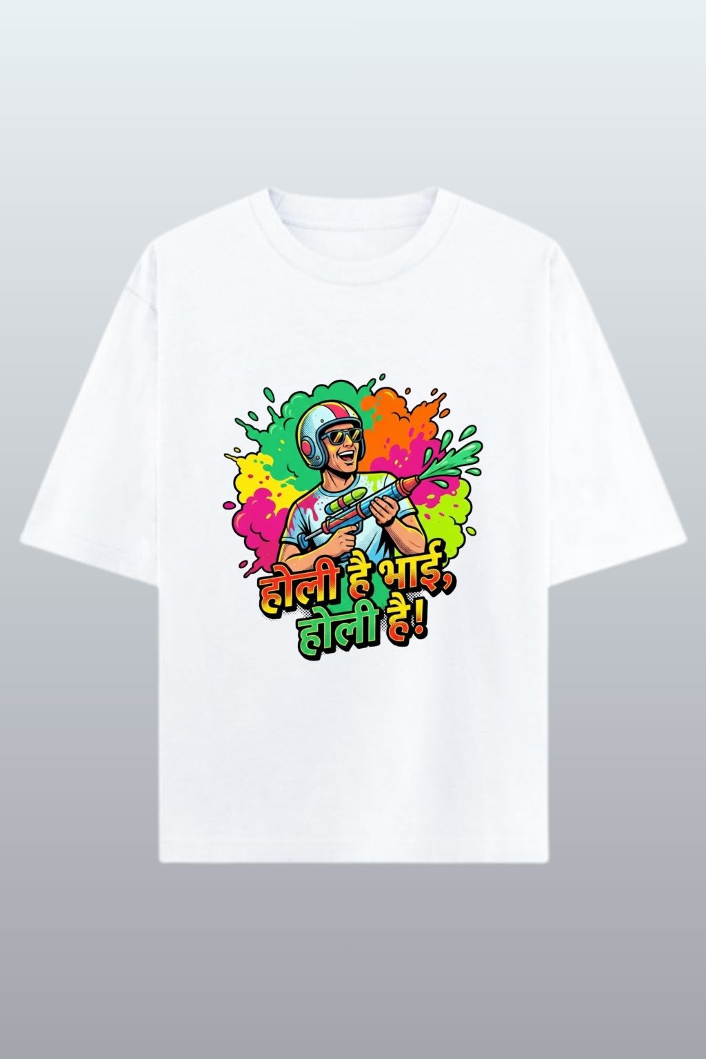 flat lay view of white oversized t-shirt with colorful graphic and text " Holi hai bhai, holi hai" on a gray background