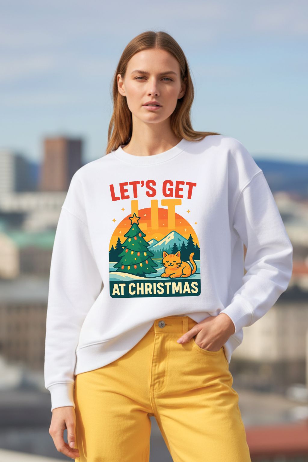 Woman wearing a white oversized sweatshirt with a Christmas design, standing outdoors.