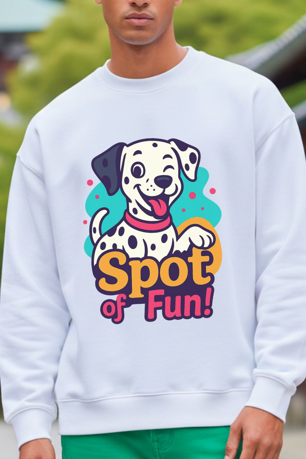 close up of a man wearing a white oversized  sweatshirt with a Dalmatian graphic and 'Spot of Fun!' text.
