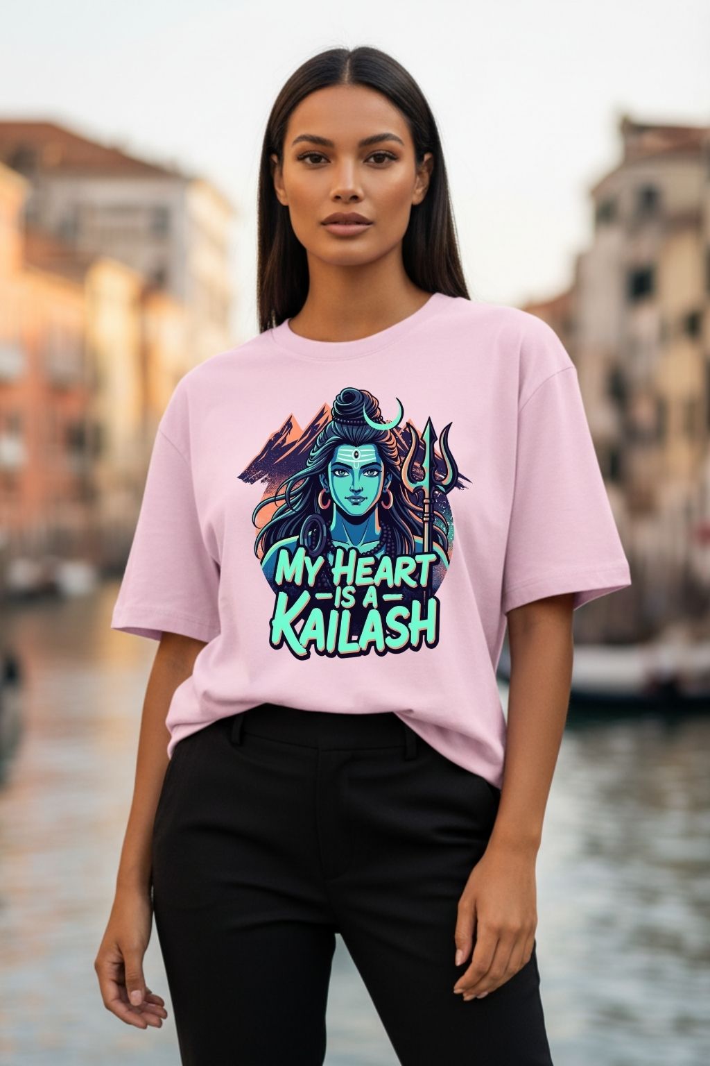 woman wearing a heart kailash design on a light baby pink oversized t-shirt