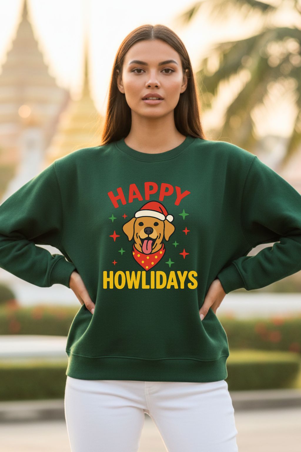 Woman wearing a bottle green oversized sweatshirt with a Christmas-themed design outdoors.