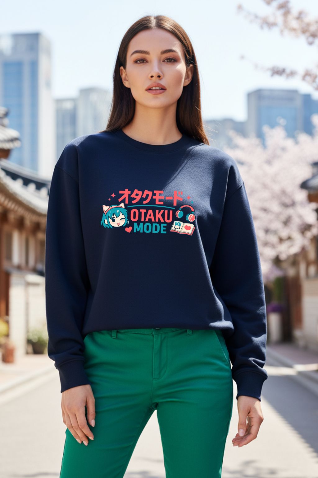 Woman wearing navy blue anime streetwear oversized sweatshirt with Otaku Mode graphic and kawaii character design, cherry blossom street background — ZUPPI