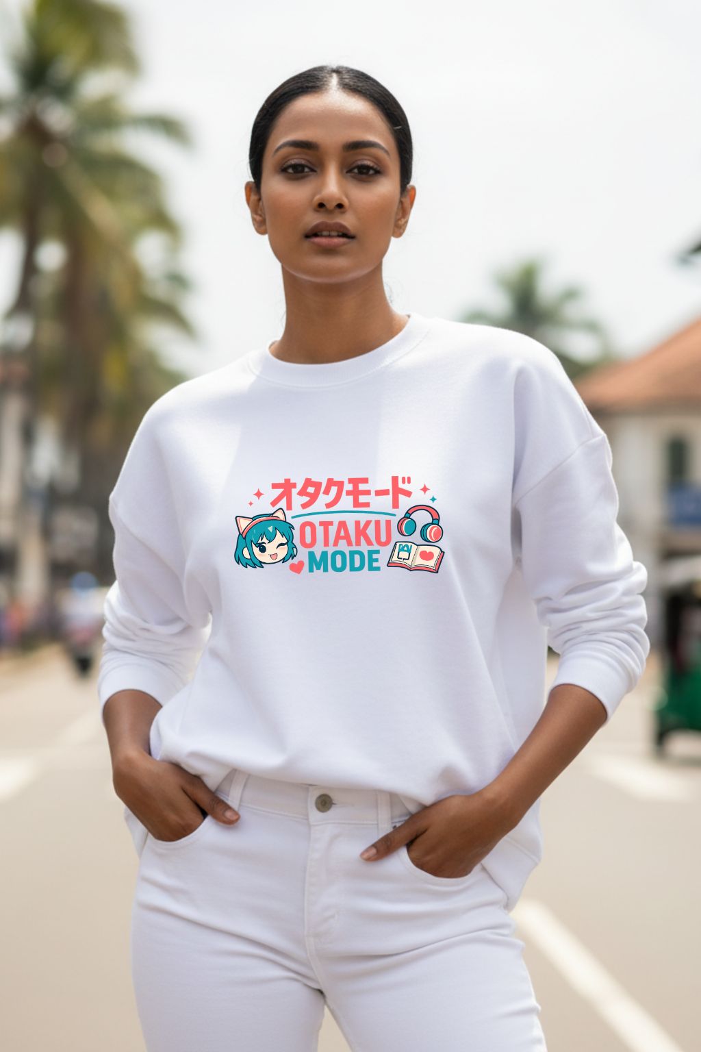 Indian woman wearing white oversized anime sweatshirt with Otaku Mode kawaii graphic print and Japanese text, casual street style — ZUPPI