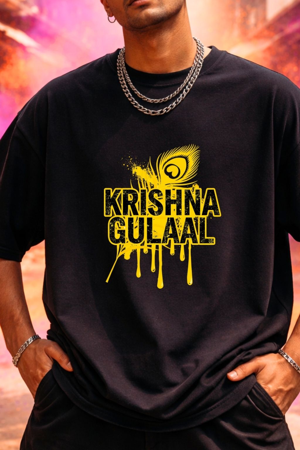 close up view of a man wearing a black oversized t-shirt with yellow 'Krishna Gulaal' design against a colorful background