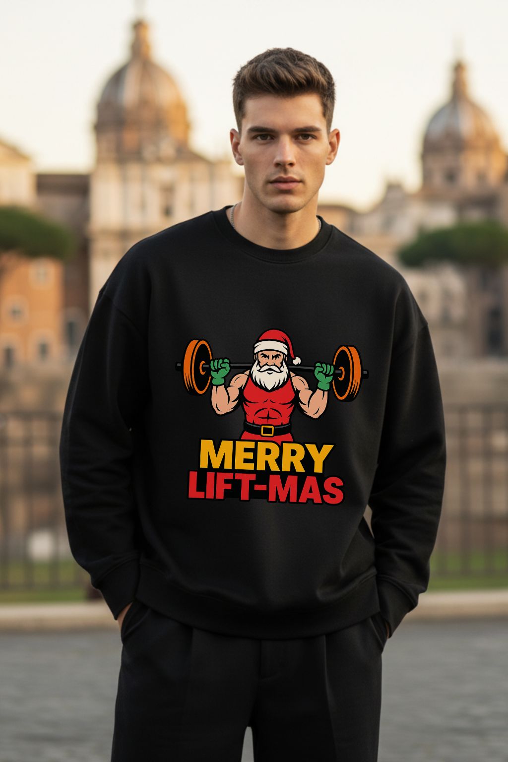 Man wearing a black oversized sweatshirt with a Christmas-themed design in an urban setting