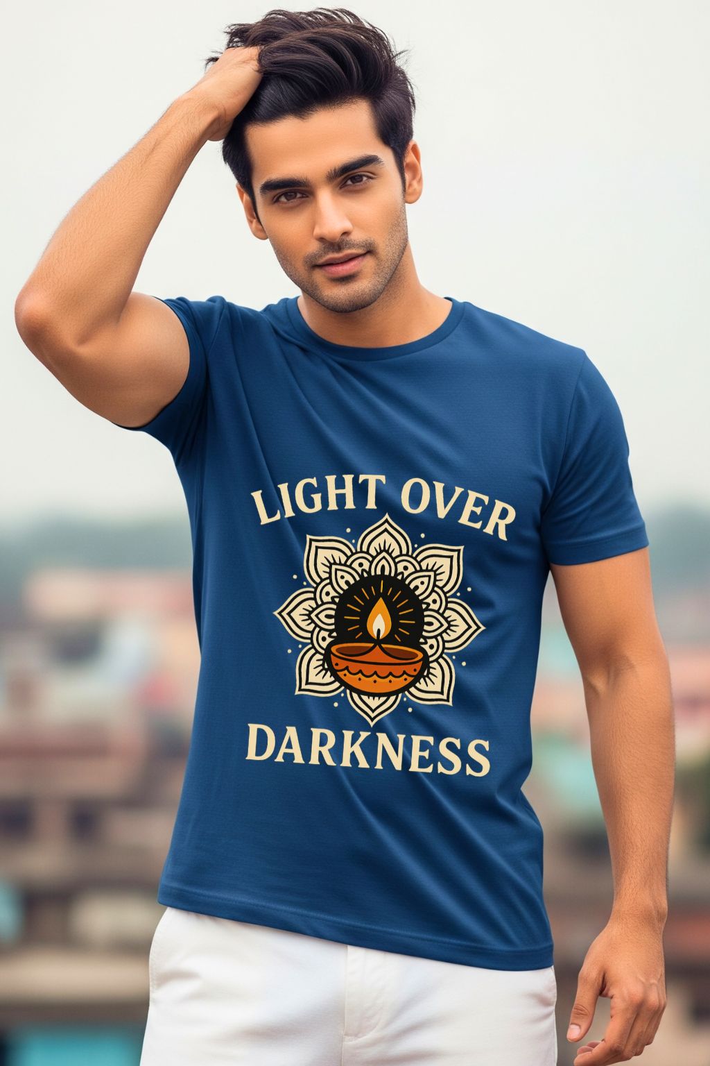 Royal blue t-shirt with a 'Light Over Darkness' graphic design. This inspirational and spiritual t-shirt is a great addition to any Indian men's casual wear collection.