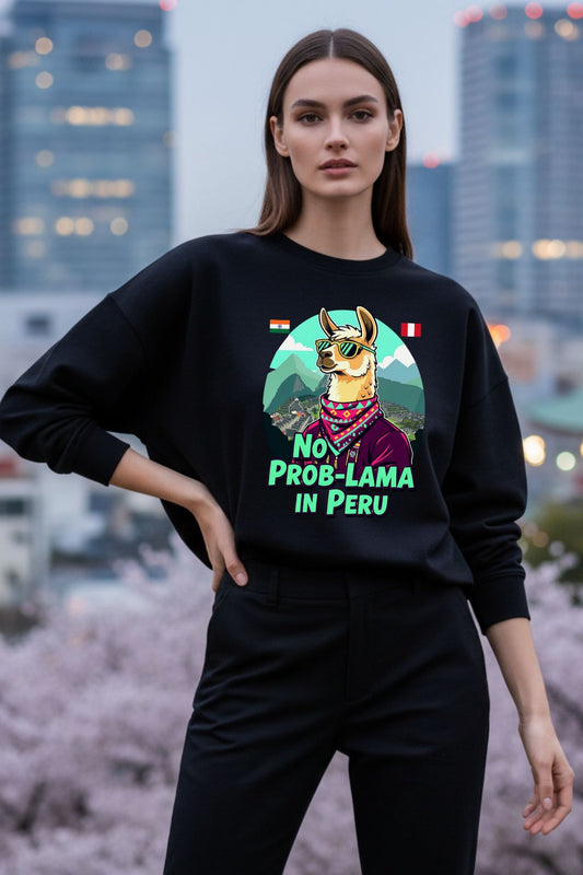 Woman wearing a black oversized sweatshirt with a llama graphic and text, standing in an urban setting.