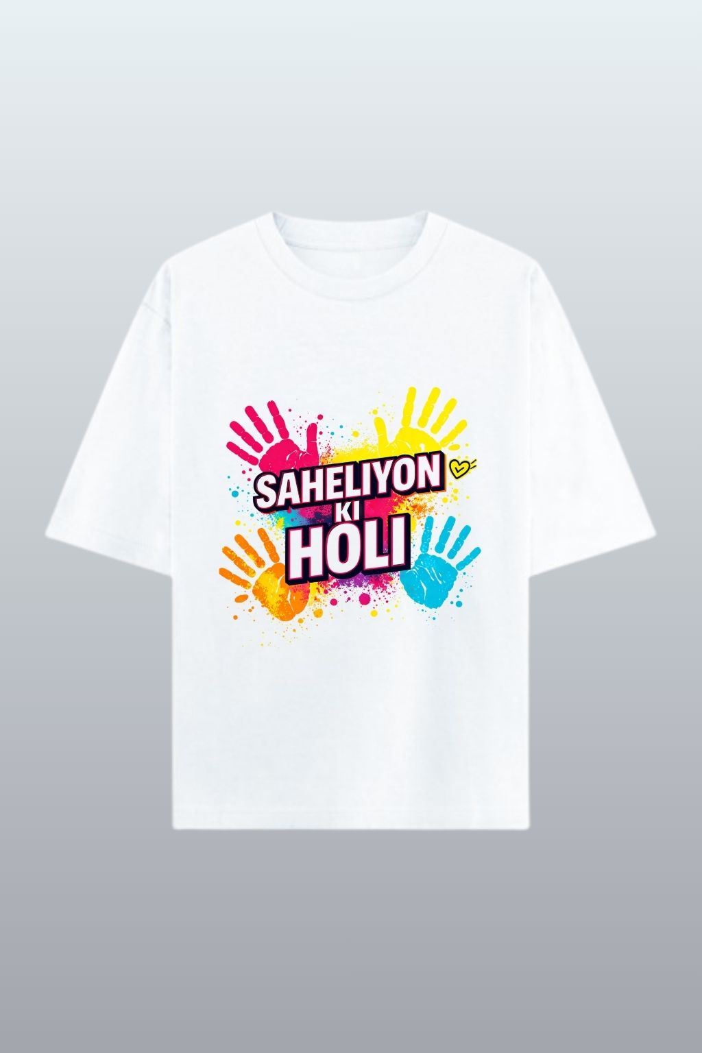 flat lay view of a White t-shirt with colorful text "saheliyon ki holi" and handprints on a gray background