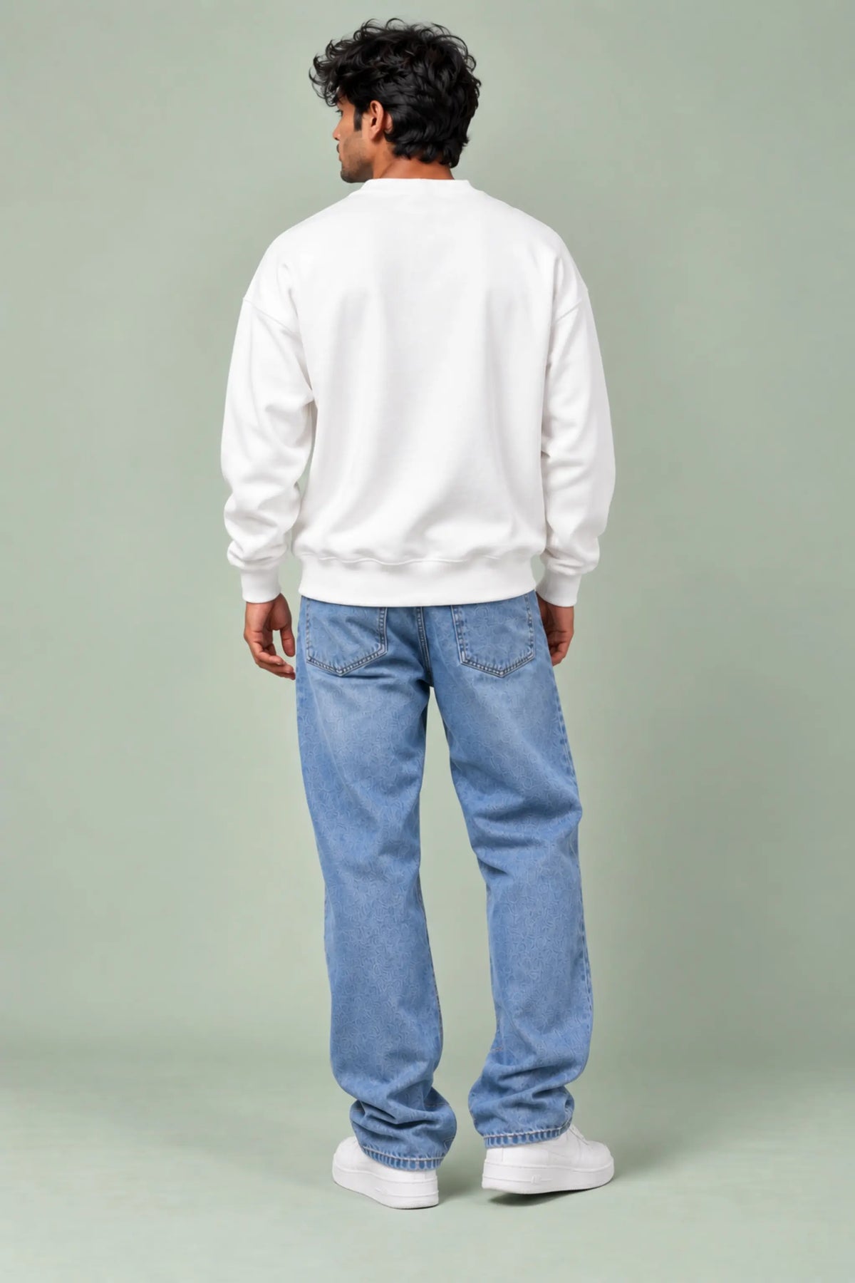 Back view of Aat Gondhal Baher Shantata white oversized sweatshirt with dropped shoulders and ribbed cuffs | JUNOSHI