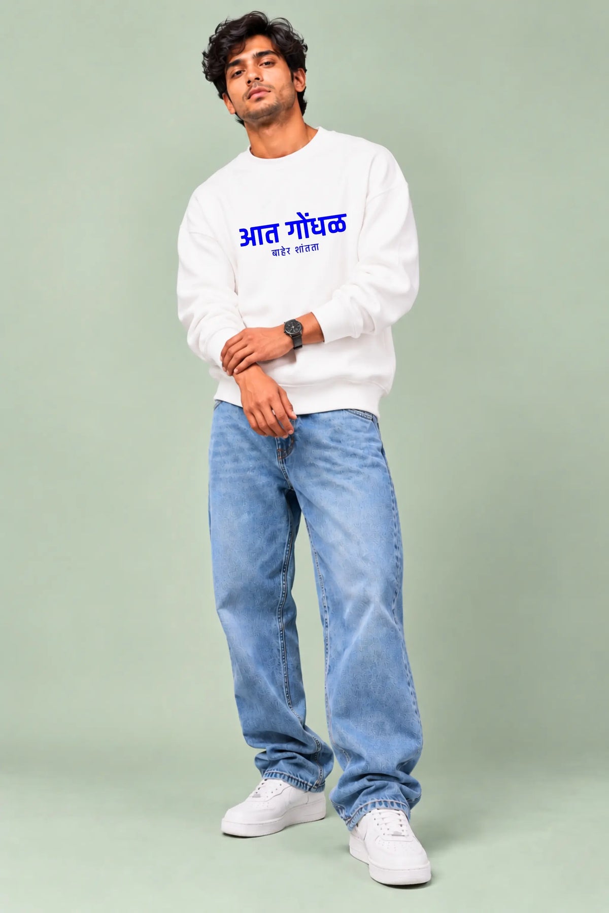Aat Gondhal Baher Shantata Marathi quote white oversized sweatshirt on male model, full front view | JUNOSHI