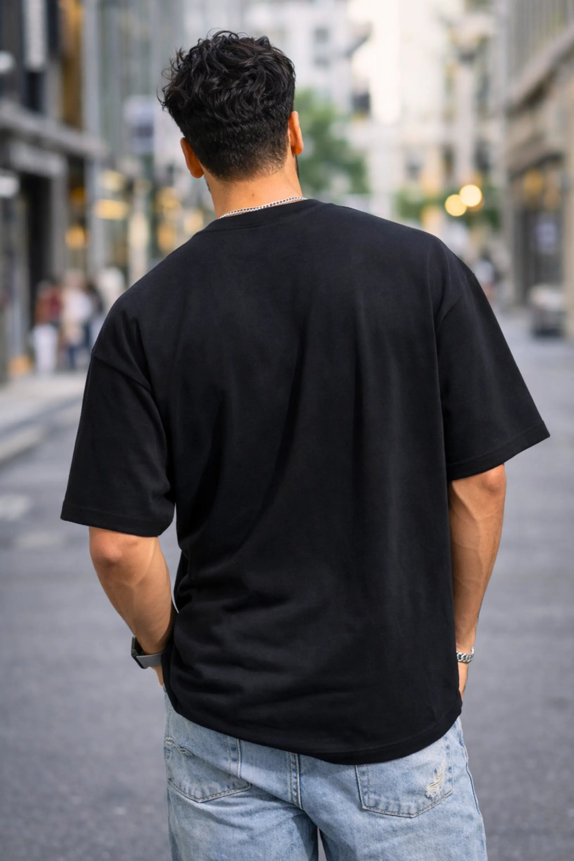 Abhi Nahi Match Chal Raha Hai — Oversized Terry Tee in Black, Back View Street Style