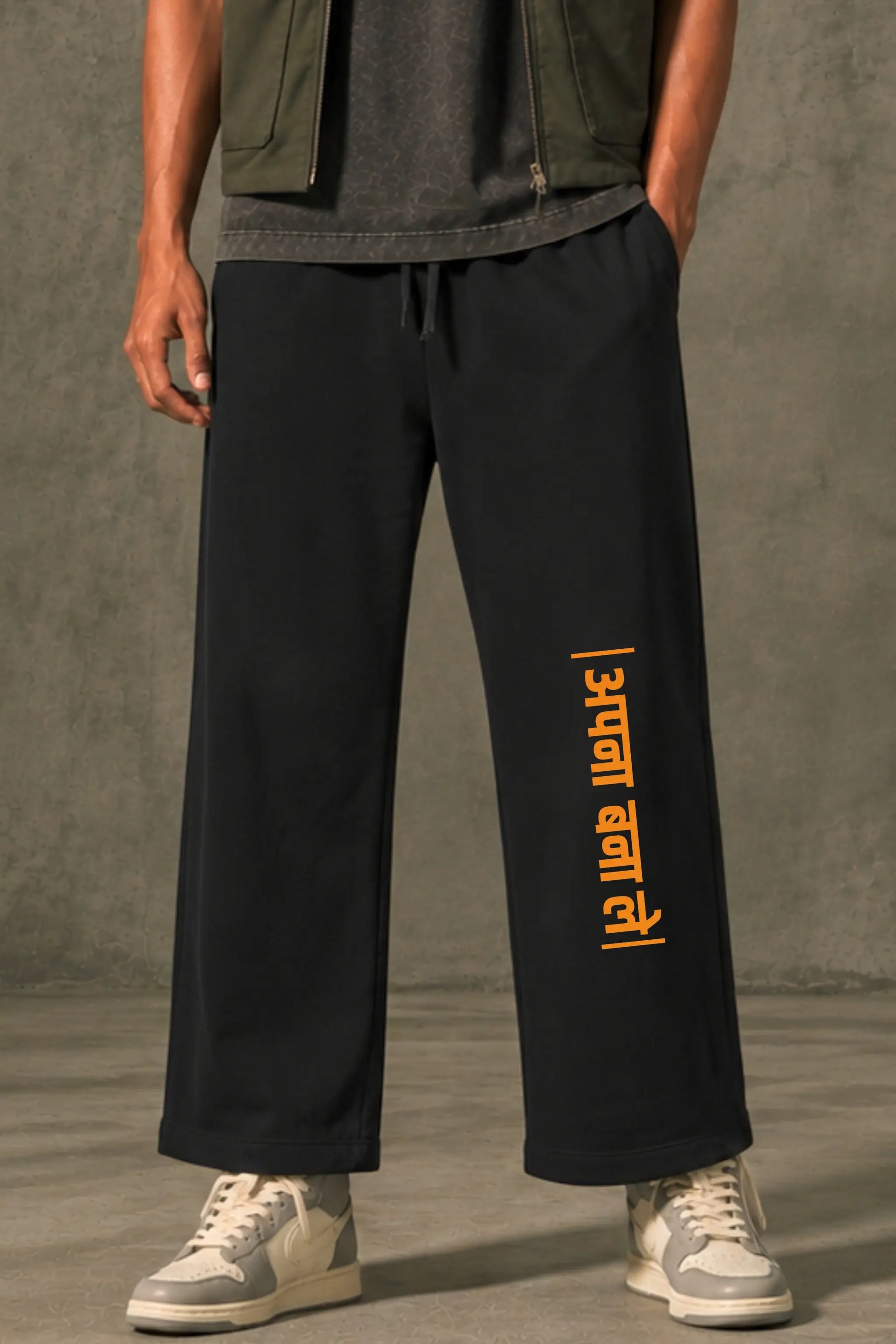 Apna Bana Le Orange Devanagari Vertical Print — Hindi Streetwear Sweatpants Leg Detail | JUNOSHI