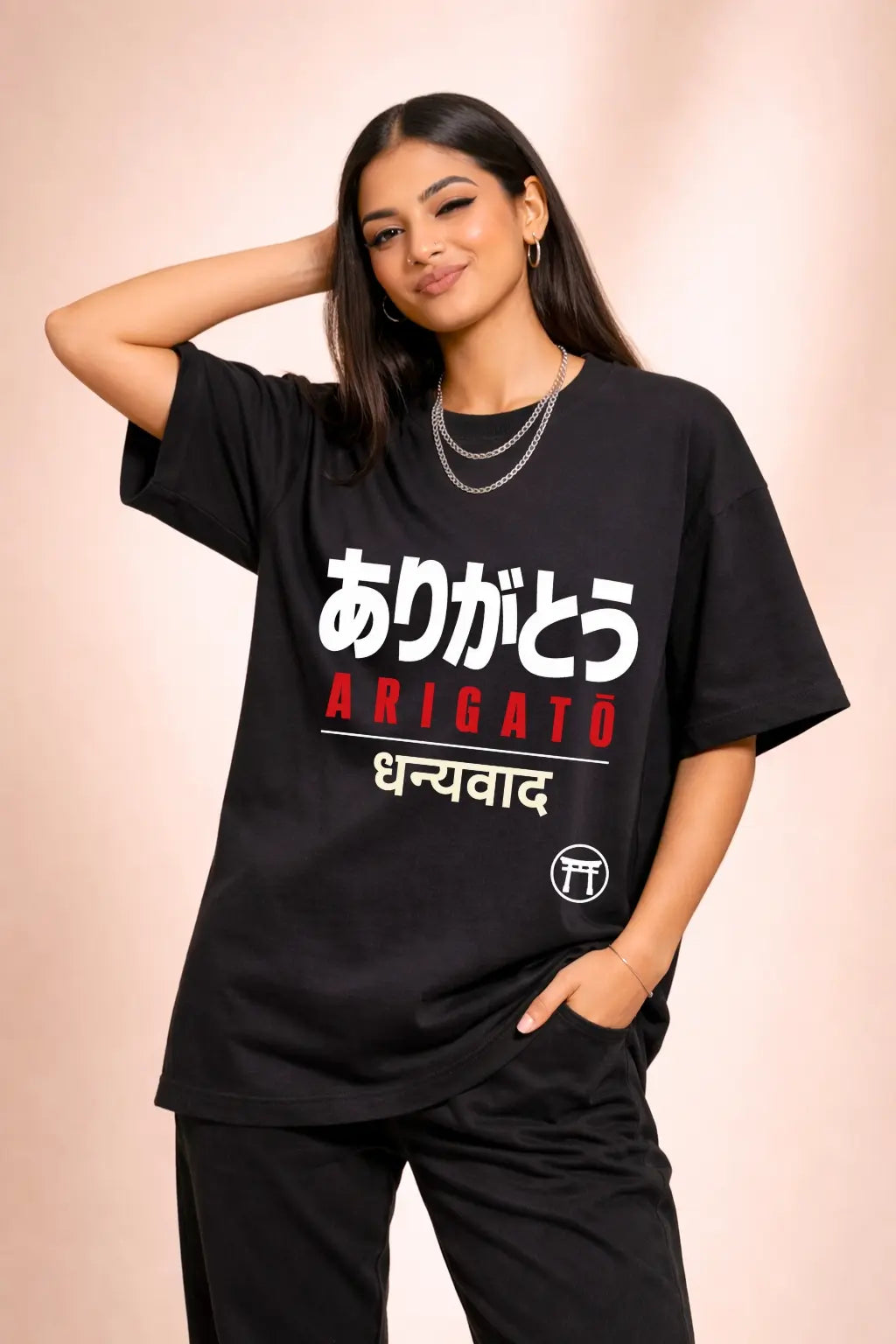 Arigatō Dhanyavad Japan Travel Oversized Tee — Women Front Model View, Three-Script Gratitude Design