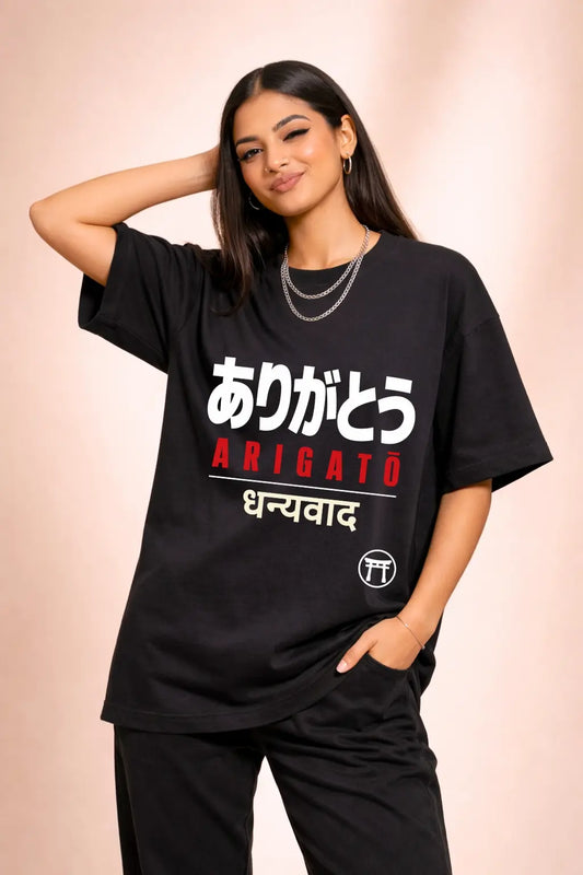 Arigatō Dhanyavad Japan Travel Oversized Tee — Women Front Model View, Three-Script Gratitude Design