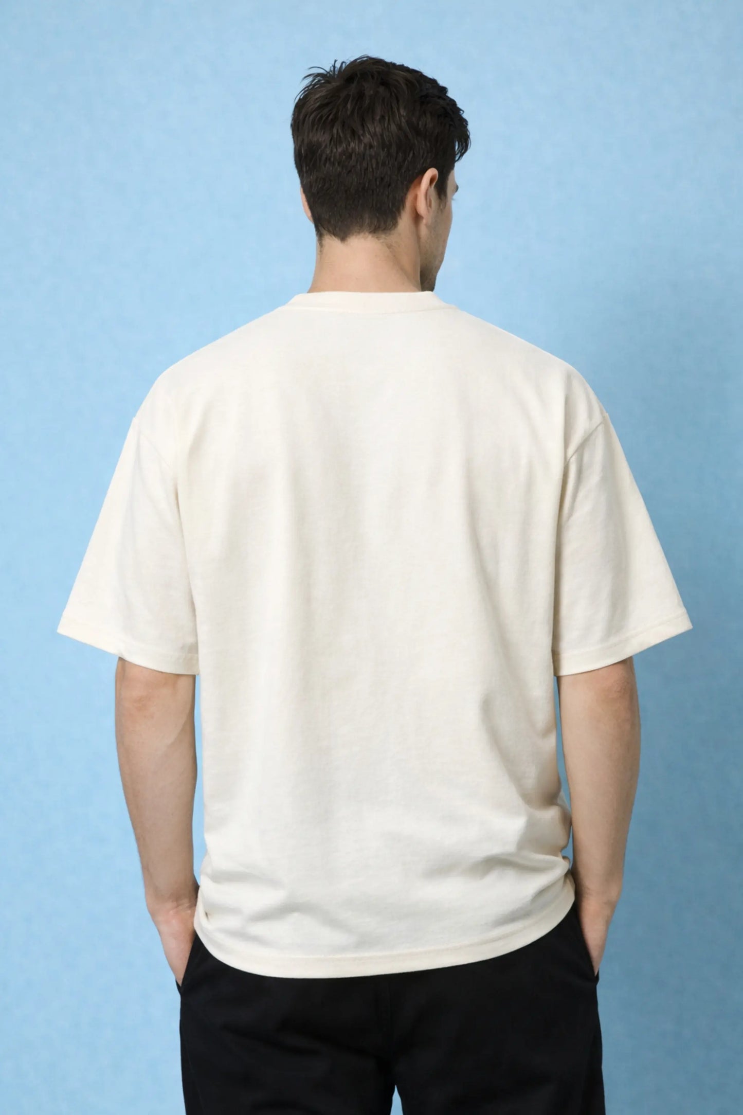 Article 17 Abolished Not Forgotten Oversized Terry Tee in Cream — Back View Male | JUNOSHI Written in Stone