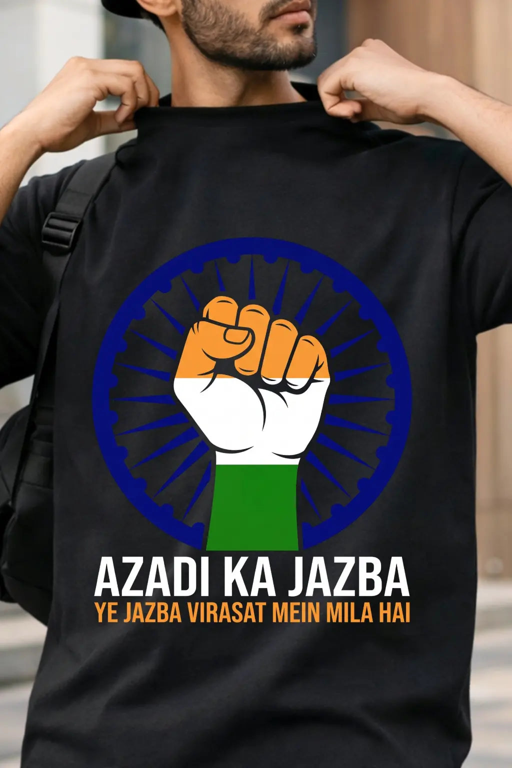 Close-up of Azadi Ka Jazba design — tricolour raised fist on Ashoka Chakra, DTF print on black oversized tee | JUNOSHI