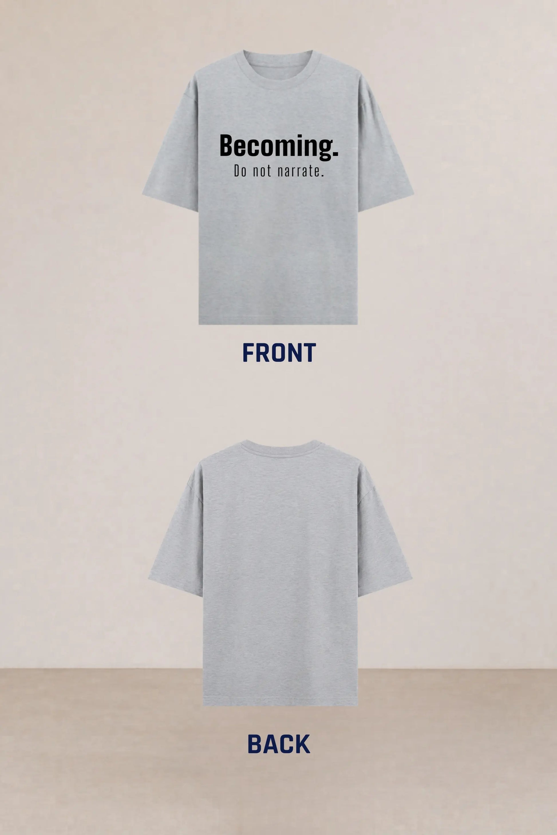 Flat lay of Becoming. Do Not Narrate grey oversized tee — front and back product view, unisex typography streetwear tee | JUNOSHI Unfiltered
