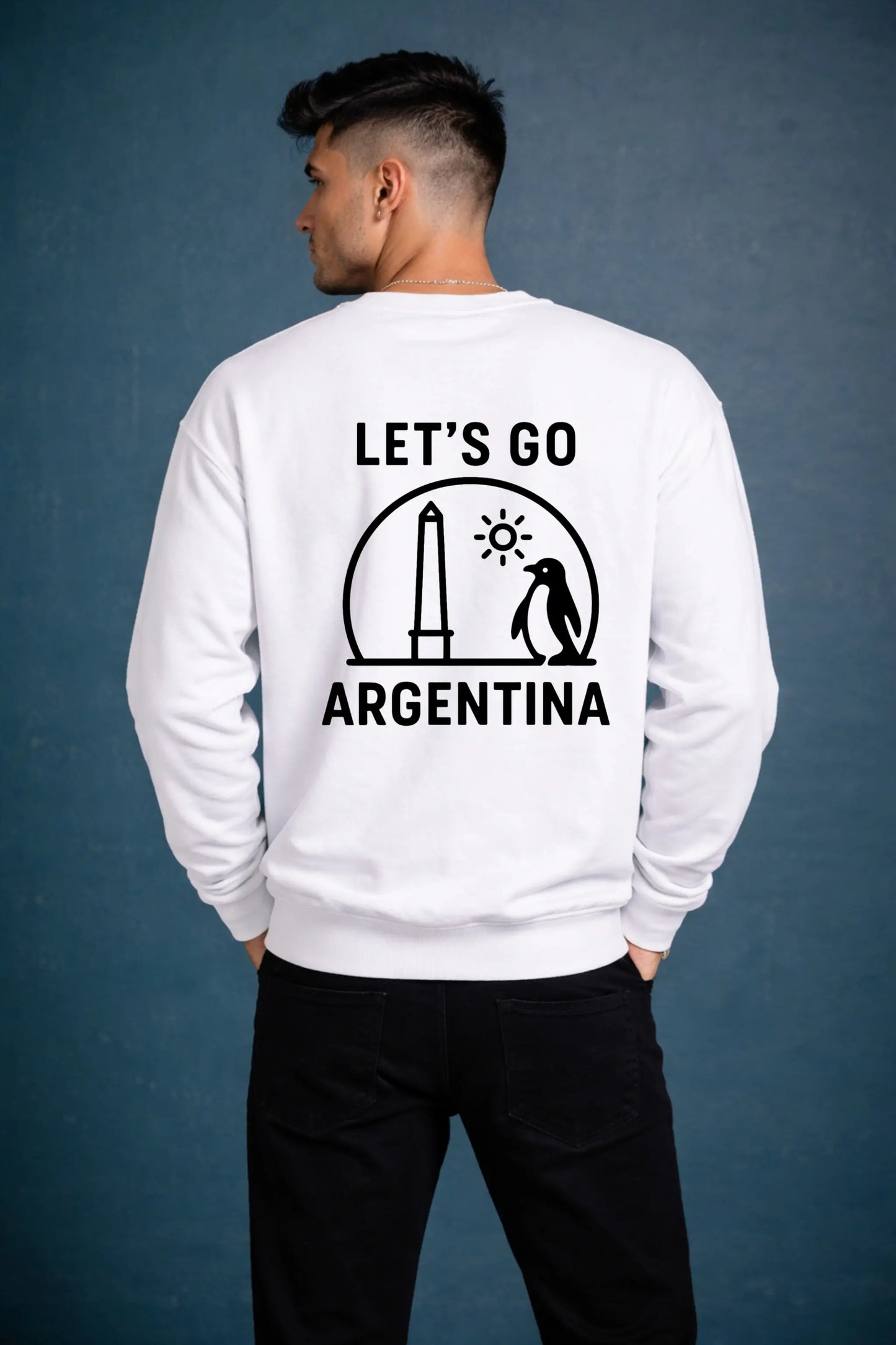 Back of white Che Argentina oversized sweatshirt — Let's Go Argentina graphic with Buenos Aires Obelisk and penguin — JUNOSHI India travel apparel