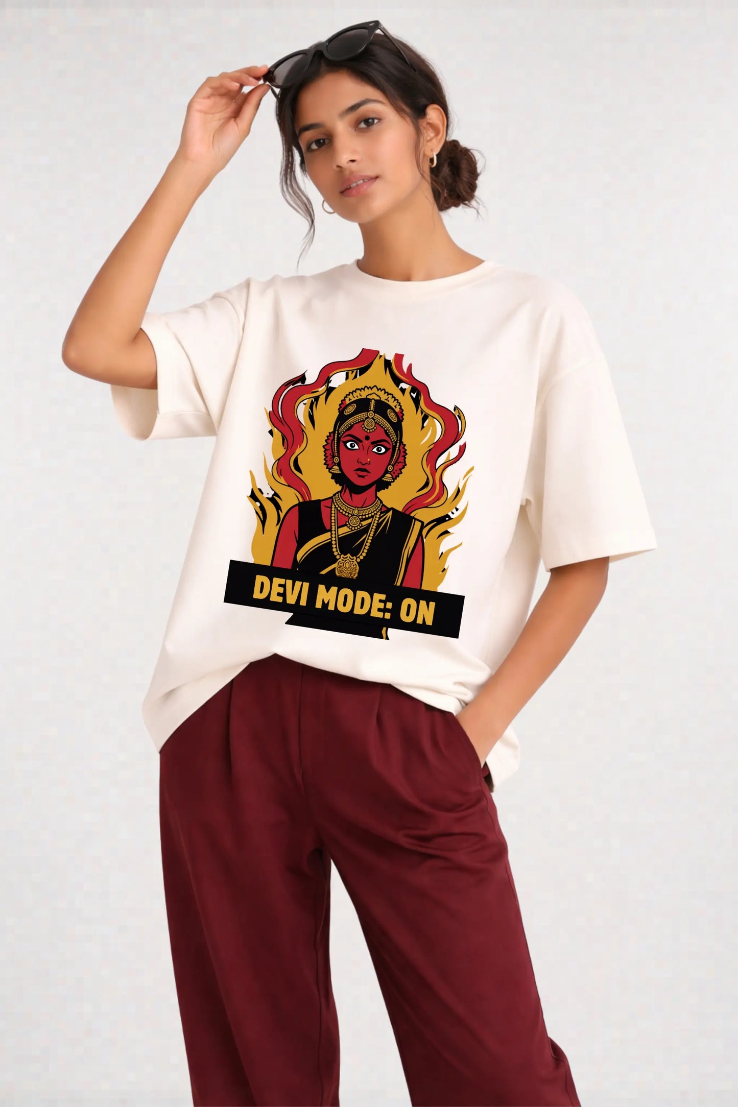 Devi Mode On anime oversized tee in off-white — front view with bold Desi manga Devi print, styled with maroon pants | JUNOSHI