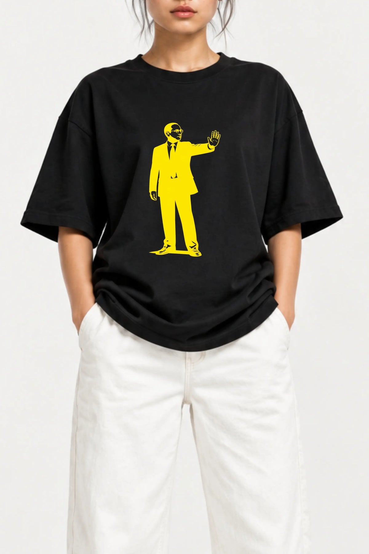 Close-up of yellow Ambedkar graphic on black Ehsaan Nahi Adhikar Hai Oversized Classic Tee | JUNOSHI