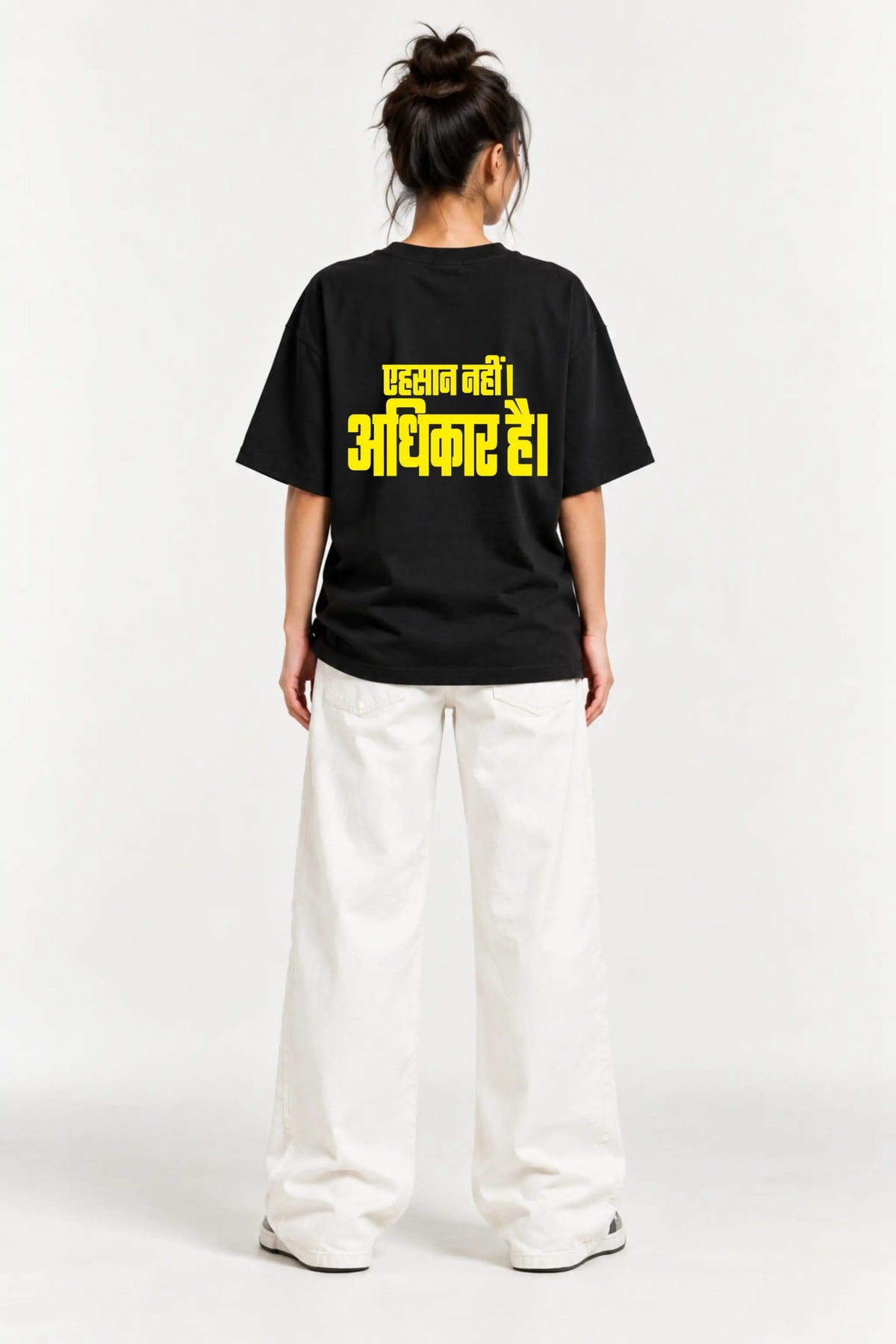 Ehsaan Nahi Adhikar Hai Hindi quote printed on the back of a black Oversized Classic Tee | JUNOSHI