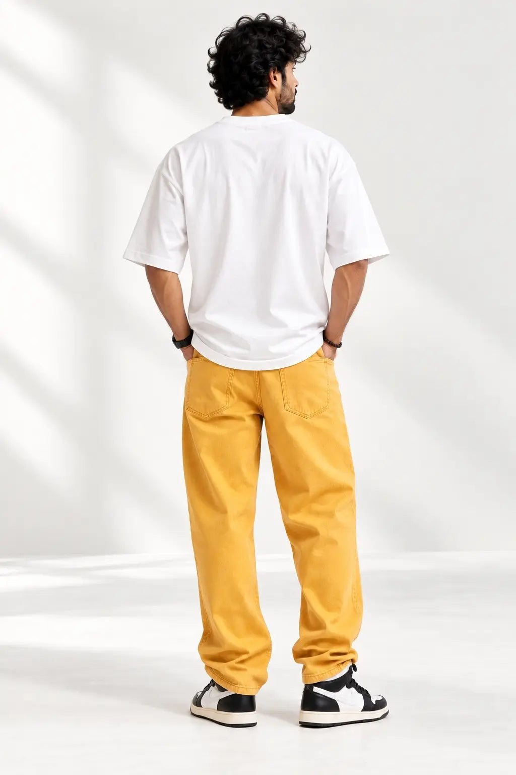Plain back of Hanuman Mighty Warrior unisex oversized classic t-shirt in white, drop-shoulder fit | JUNOSHI