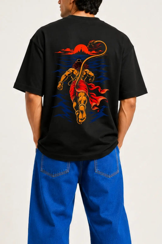 Samudra Langhan Hanuman oversized t-shirt close-up featuring back-view Hanuman leaping across the ocean toward Lanka at sunset — Divine Street devotional streetwear