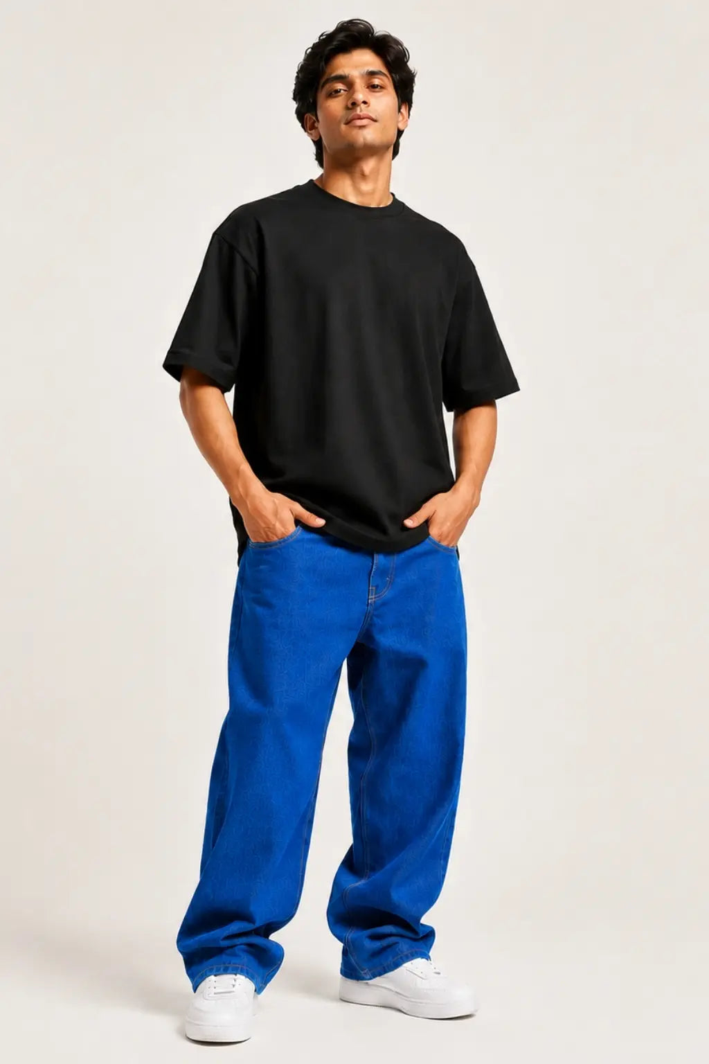 Hanuman Samudra Langhan oversized t-shirt front view on male model showing relaxed unisex fit — Divine Street devotional streetwear