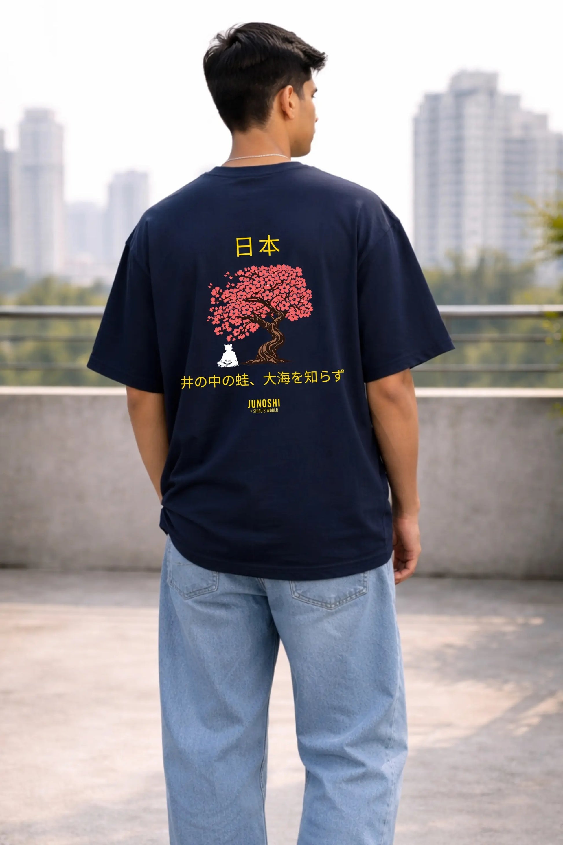 Back view of navy blue Japanese proverb kanji oversized terry t-shirt — men's streetwear — JUNOSHI Shifu's World