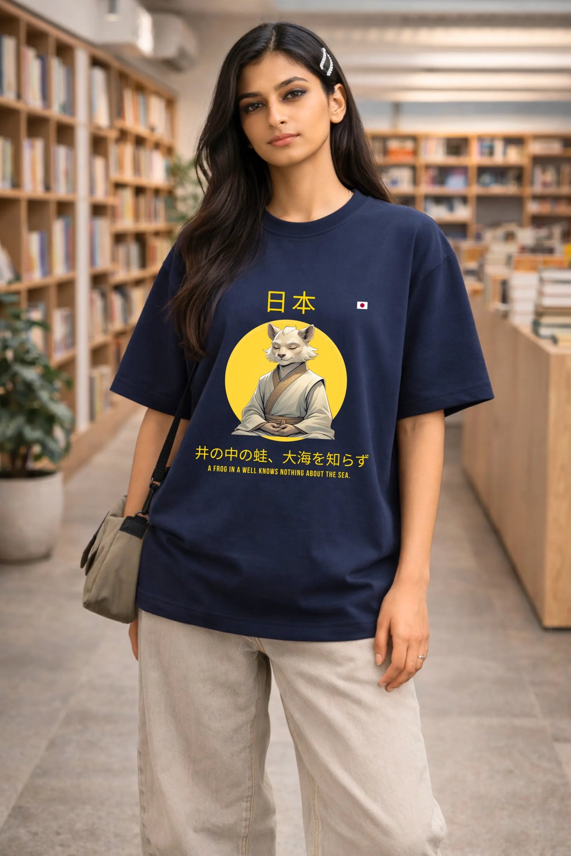 Japanese kanji frog and sea proverb graphic oversized terry t-shirt in navy blue — women's front view — JUNOSHI
