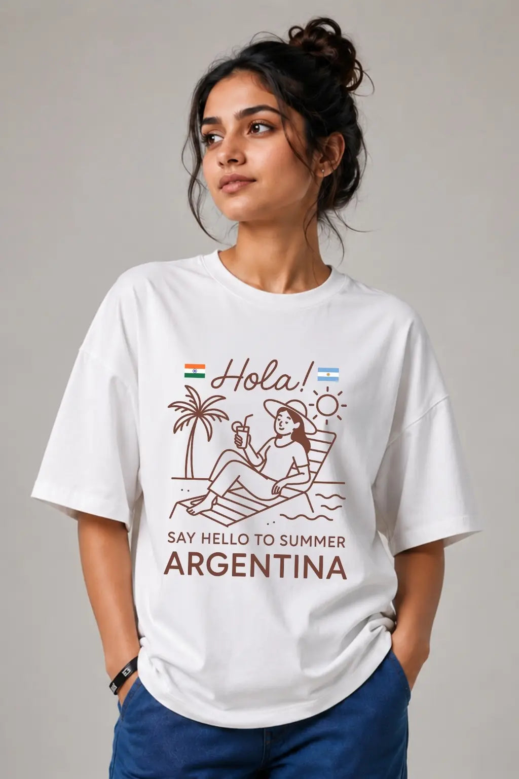 JUNOSHI Hola Argentina oversized t-shirt front view worn by Indian woman — India Argentina travel graphic tee