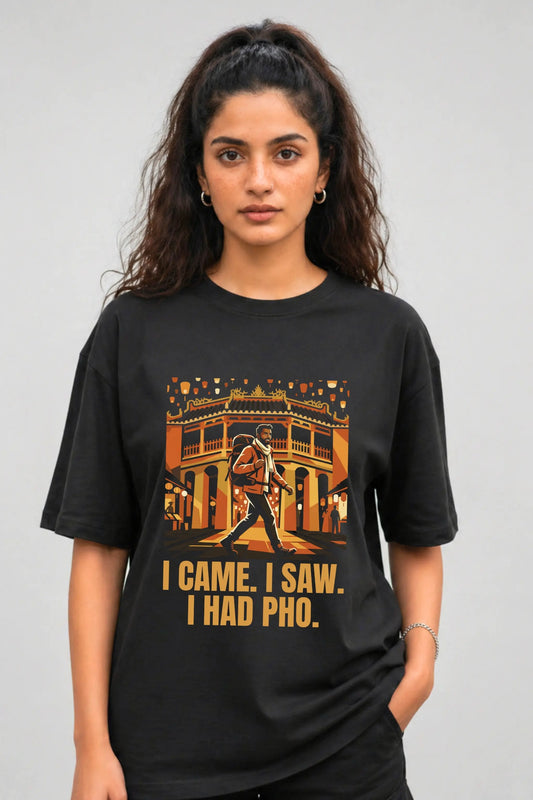 Black oversized graphic tee with Hội An Vietnam print and I Came I Saw I Had Pho text, worn by Indian woman, JUNOSHI