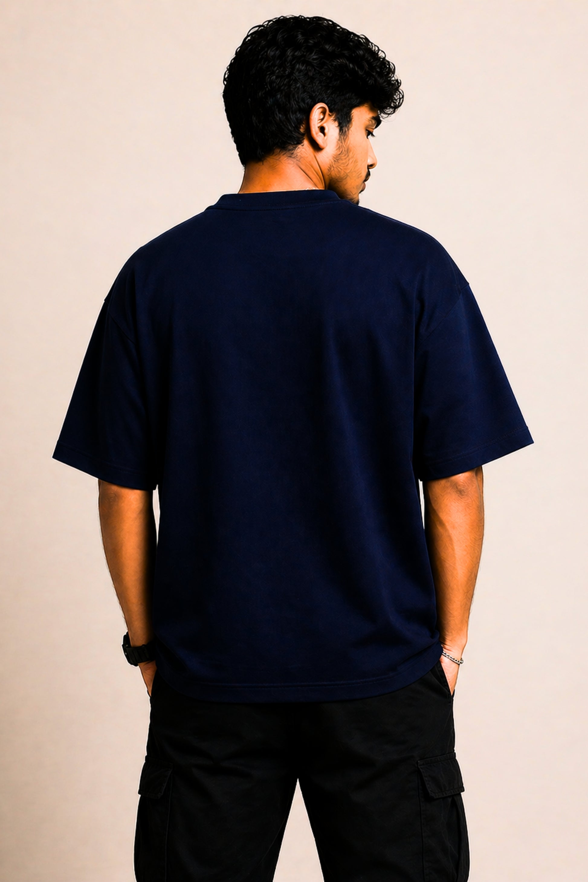 Back view of navy oversized drop-shoulder tee — JUNOSHI Unfiltered Collection
