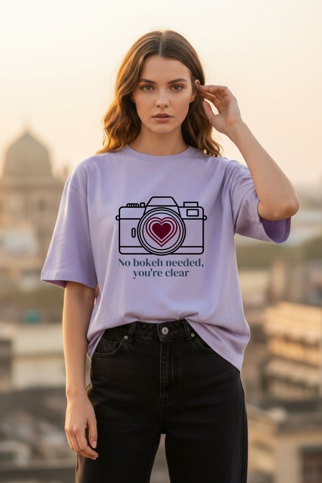 Love Focus Photographer Tee in lavender — unisex oversized fit, worn by a woman outdoors | JUNOSHI Romance Edit