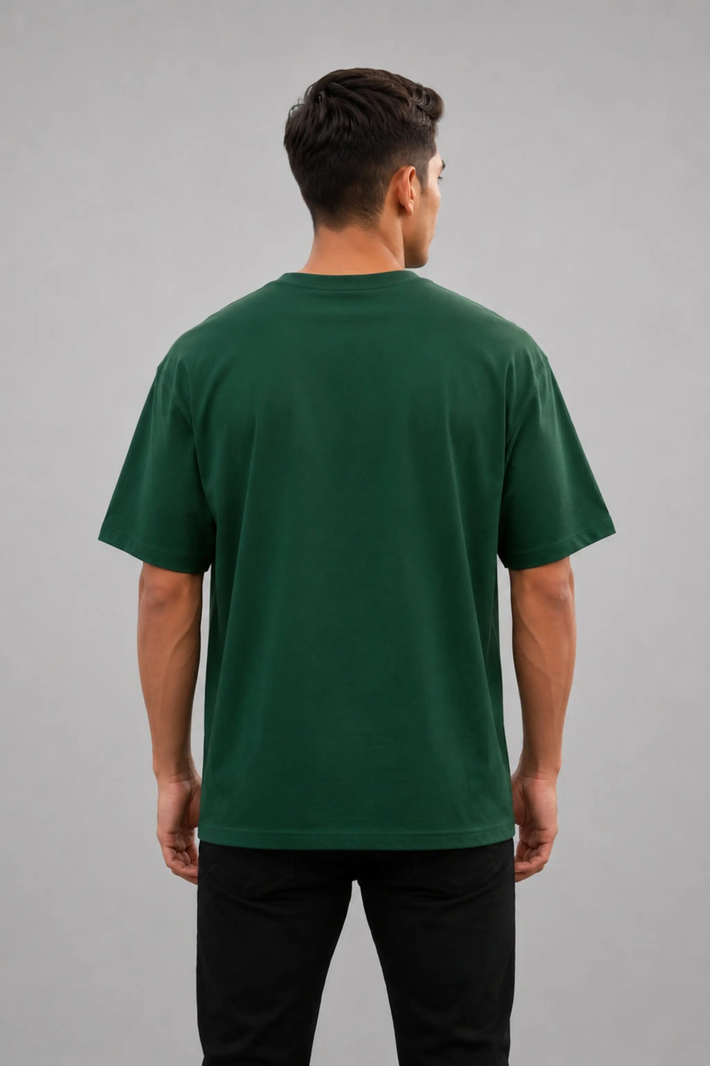 Made In India. Uninstallable. — Bottle Green Unisex Oversized Tee, Men's Back View | JUNOSHI Unfiltered