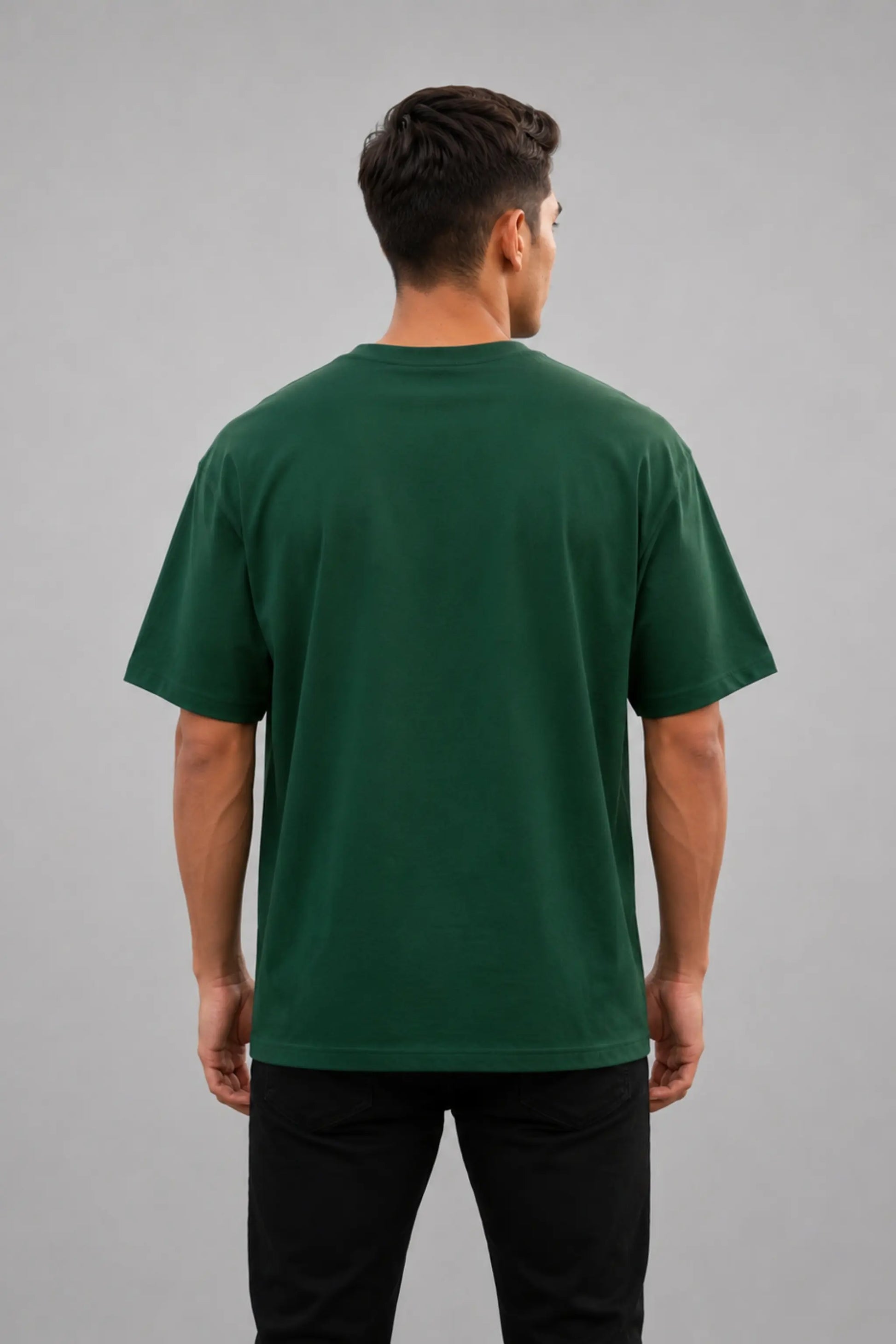 Made In India. Uninstallable. — Bottle Green Unisex Oversized Tee, Men's Back View | JUNOSHI Unfiltered