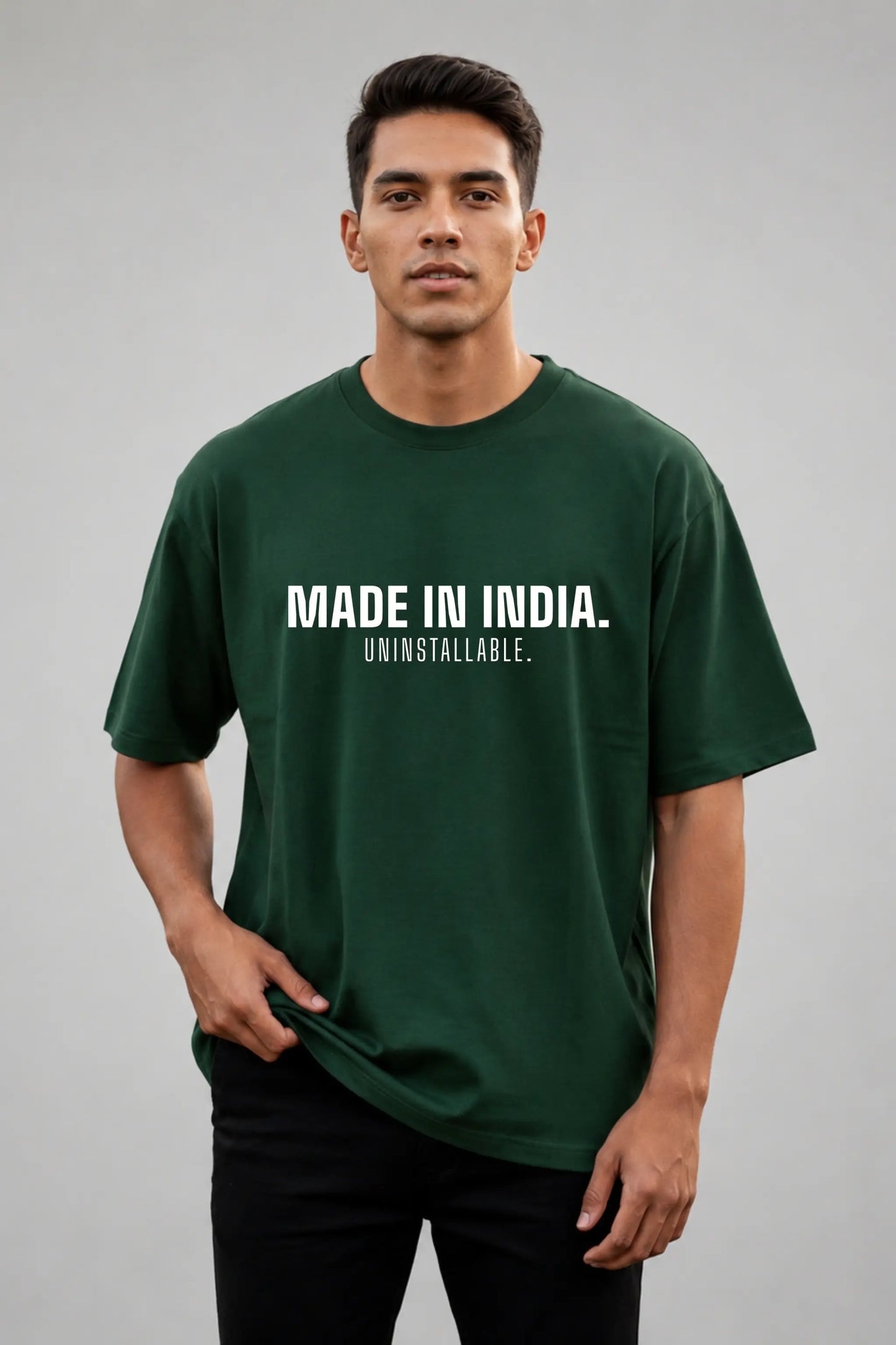 Made In India. Uninstallable. — Bottle Green Oversized Tee, Men's Full Body Front View | JUNOSHI Unfiltered