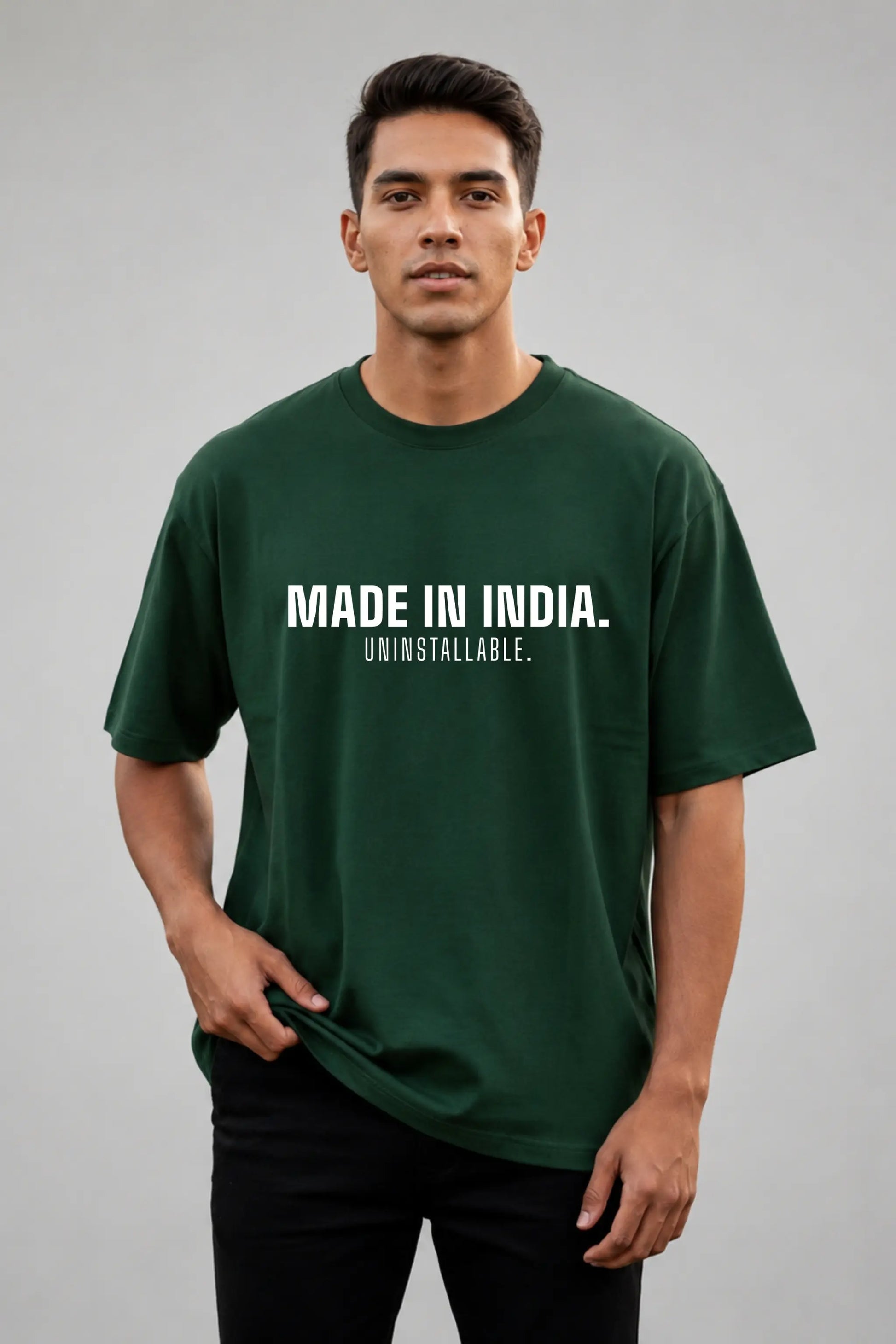 Made In India. Uninstallable. — Bottle Green Oversized Tee, Men's Full Body Front View | JUNOSHI Unfiltered