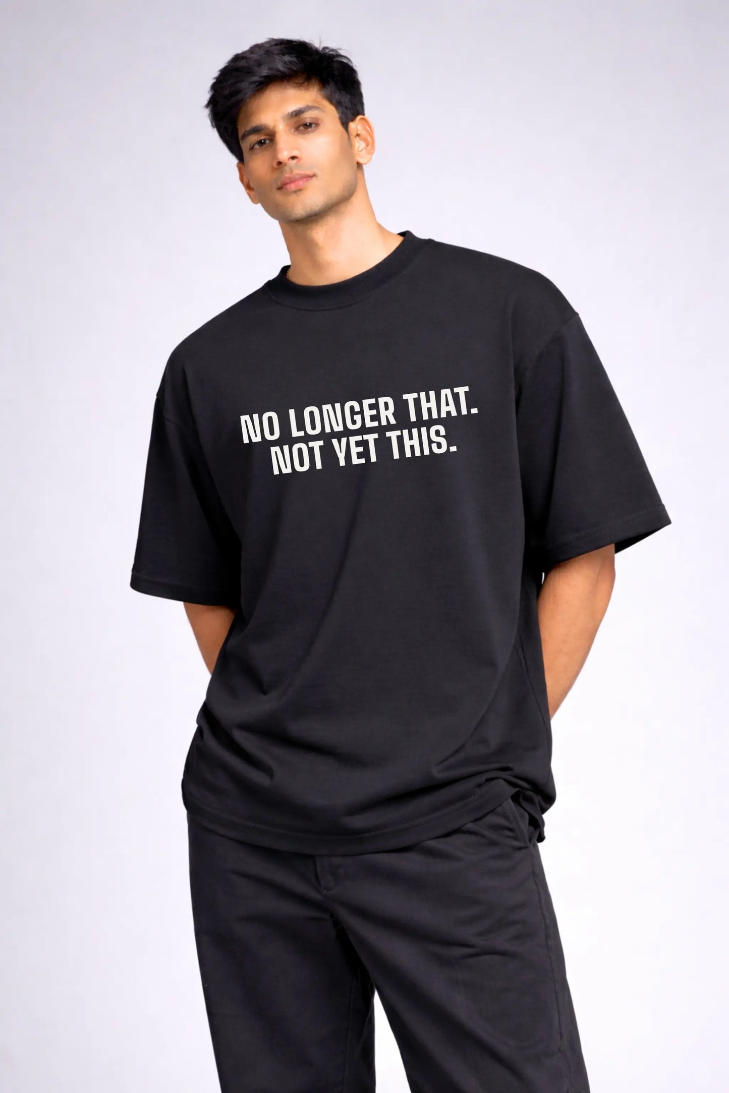 No Longer That Not Yet This — Black Oversized Tee for Men, Full Body Front View | JUNOSHI