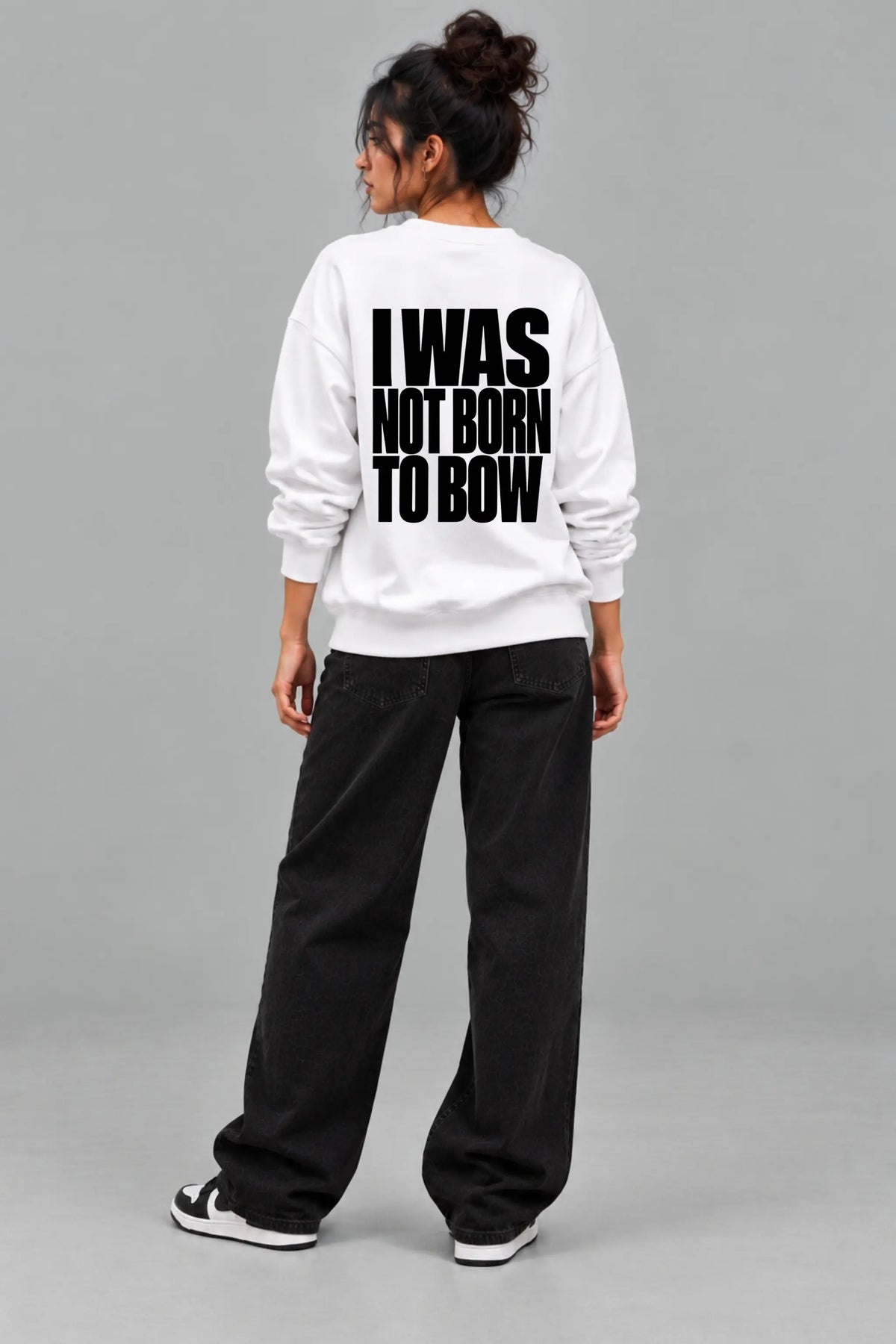 Not Born To Bow — Constitutional Pride Oversized Sweatshirt, bold slogan back print on woman model | JUNOSHI