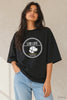 Black oversized unisex tee with bold Lab Life brutalist badge — white circle, Labrador silhouette, gold bar, breed name stamped clean. Part of the JUNOSHI Pet Pawtrait drop.