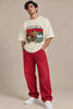 Man in Cam On Vietnam — Gratitude Travel Oversized Terry T-Shirt and red jeans, style reel | JUNOSHI