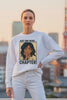 Woman wearing Just One More Chapter white anime oversized sweatshirt — desi anime girl manga panel graphic with bold chapter print — anime streetwear for men by JUNOSHI India