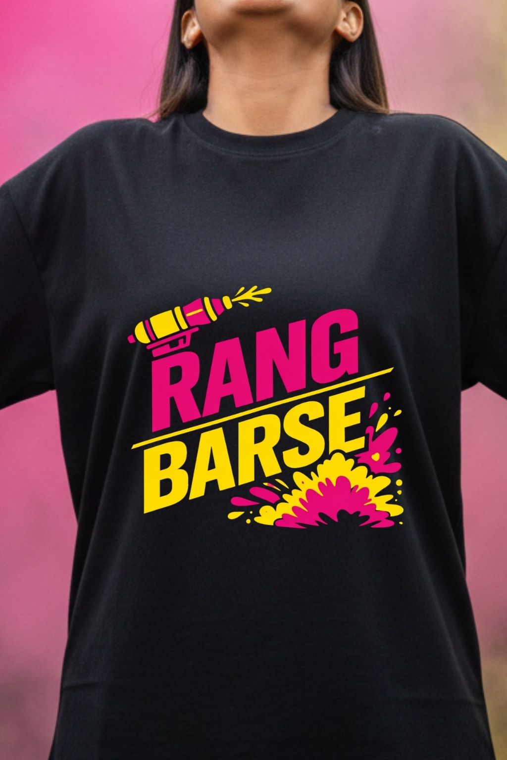 Close-up of bold colourful Rang Barse Holi graphic on black oversized t-shirt — premium DTF print by JUNOSHI