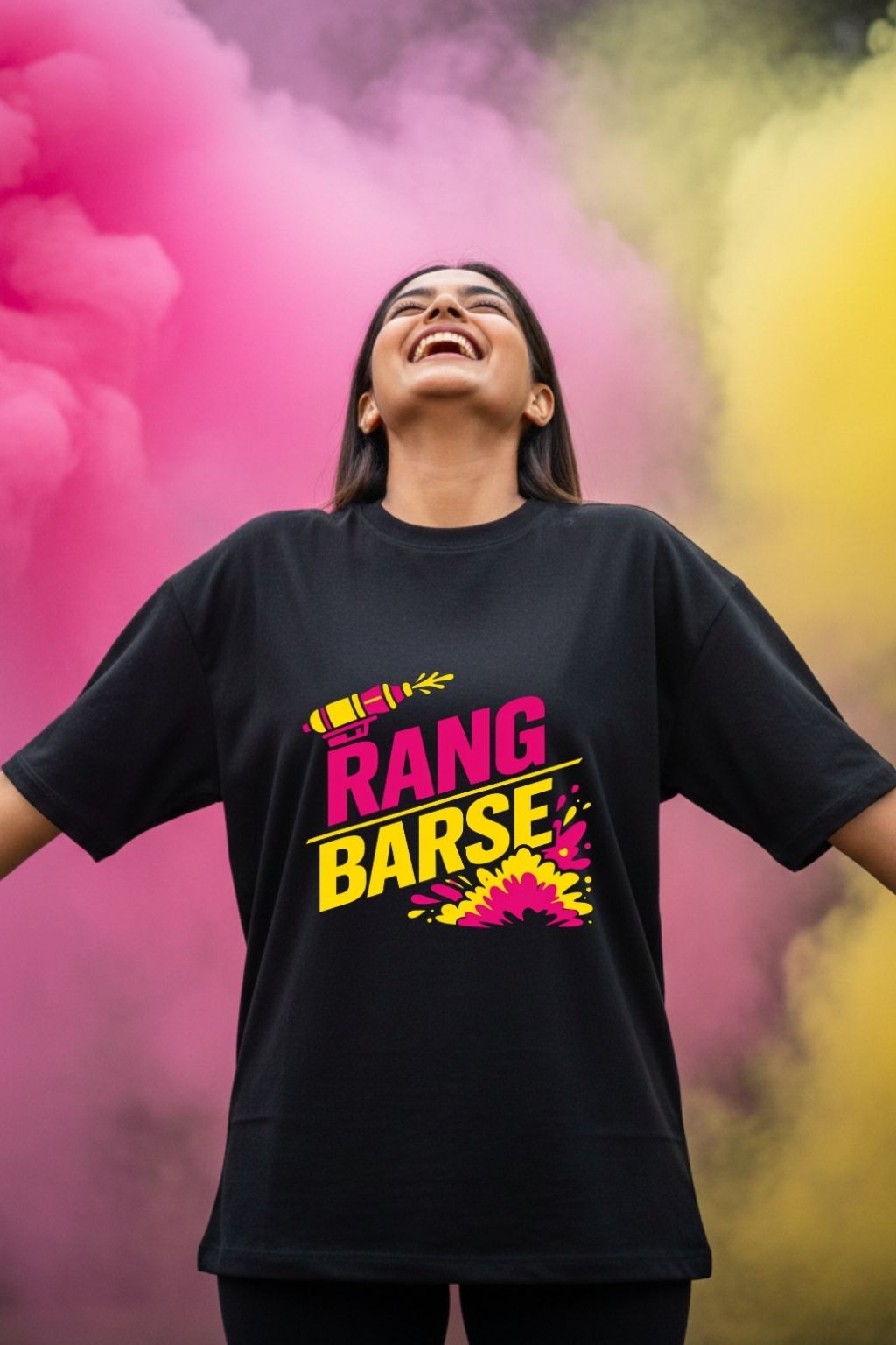 Woman wearing Rang Barse Holi Hype black unisex oversized t-shirt with bold colourful graphic — JUNOSHI Holi drop