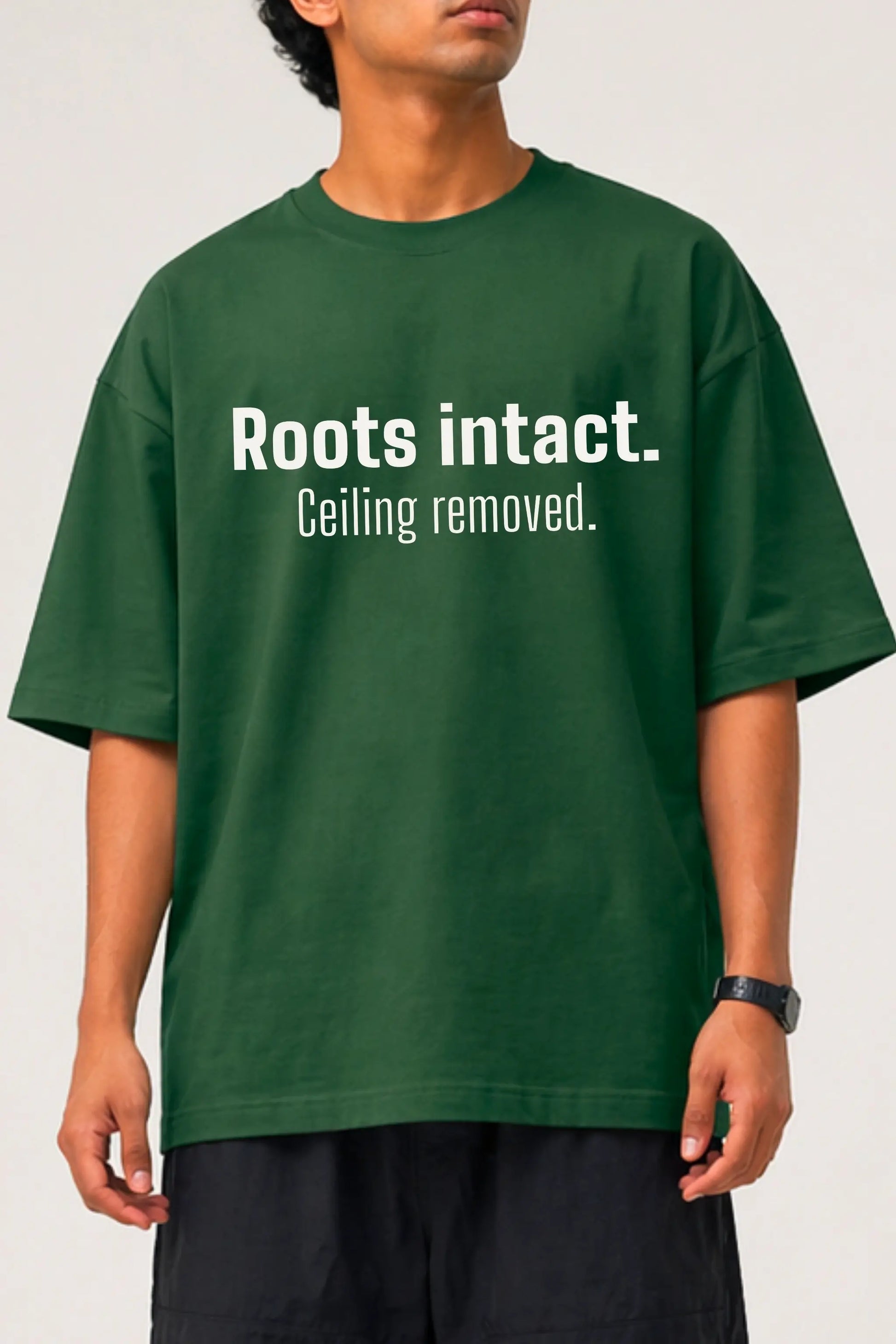 Roots Intact Ceiling Removed — Unisex Oversized Tee Front Closeup, Forest Green | JUNOSHI