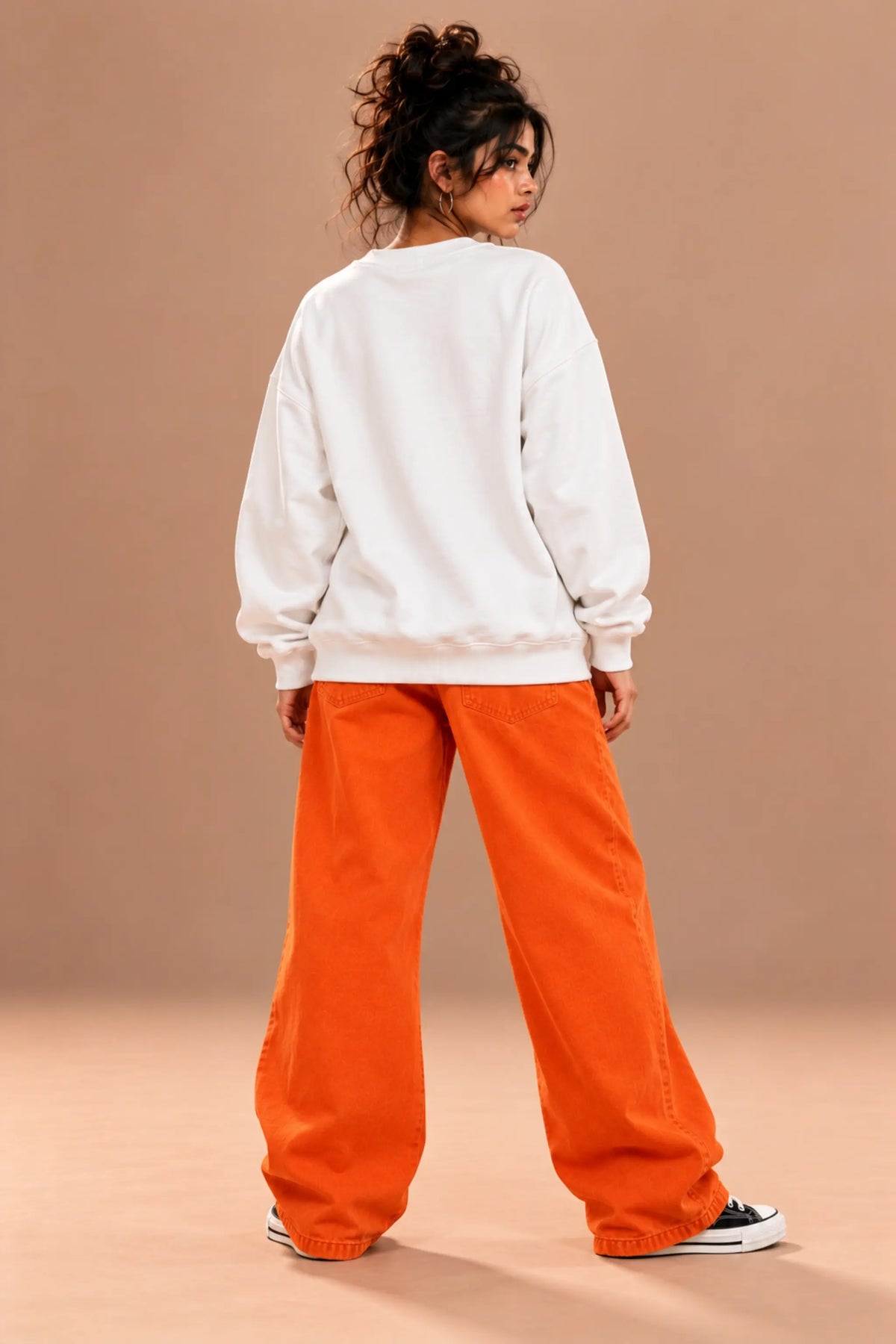 Back view of Training Arc white oversized sweatshirt for women, drop-shoulder fit with clean plain back | JUNOSHI